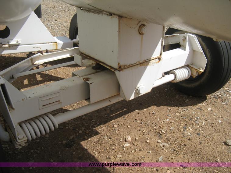 image for item E3224 Anhydrous ammonia tank on running gear