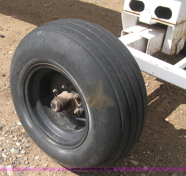 image for item E3224 Anhydrous ammonia tank on running gear