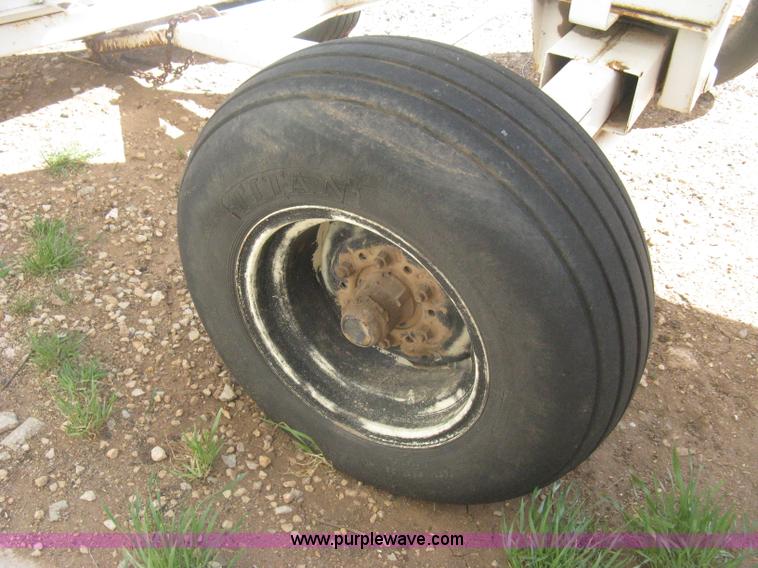 image for item E3224 Anhydrous ammonia tank on running gear