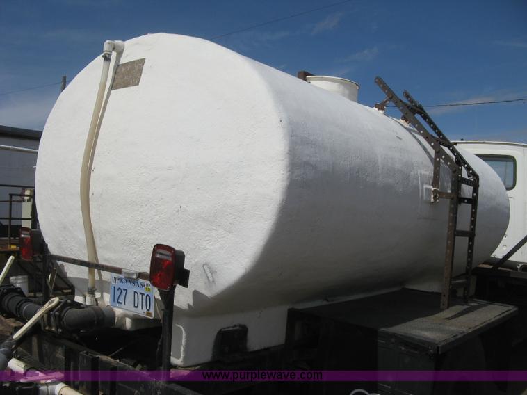 image for item E3226 1974 Ford 700 tender truck