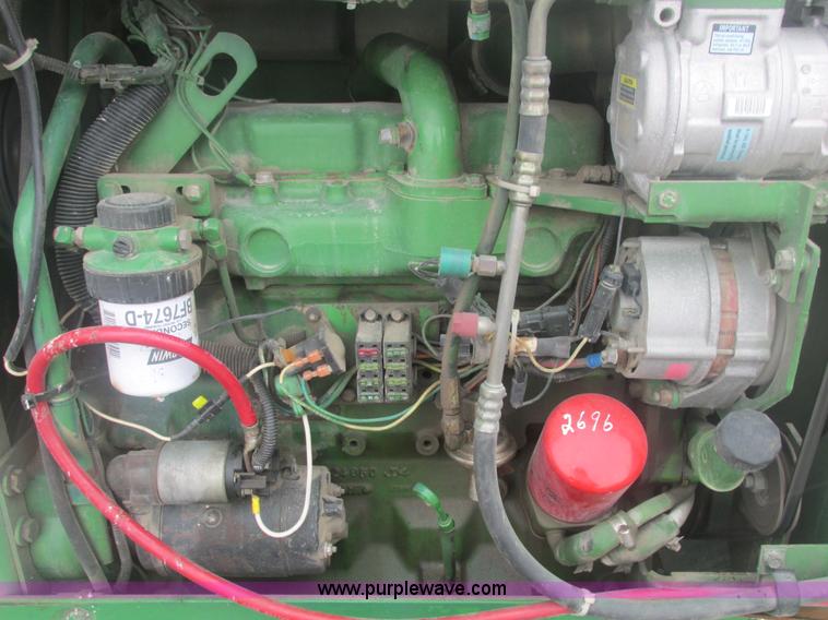 image for item E7119 1995 John Deere 6500 sprayer