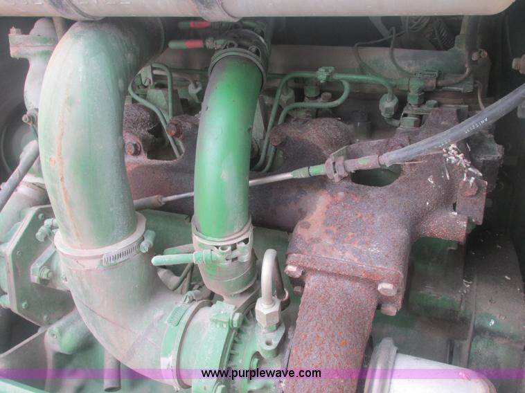 image for item E7119 1995 John Deere 6500 sprayer
