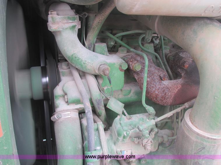 image for item E7119 1995 John Deere 6500 sprayer