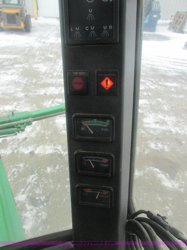 image for item E7119 1995 John Deere 6500 sprayer