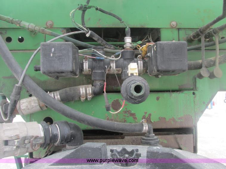 image for item E7119 1995 John Deere 6500 sprayer