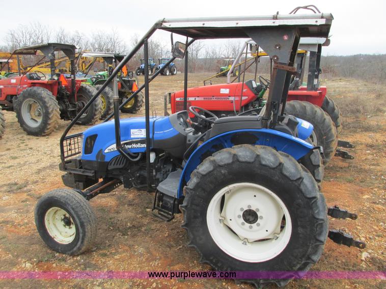 image for item F4469 2004 New Holland TN70 tractor