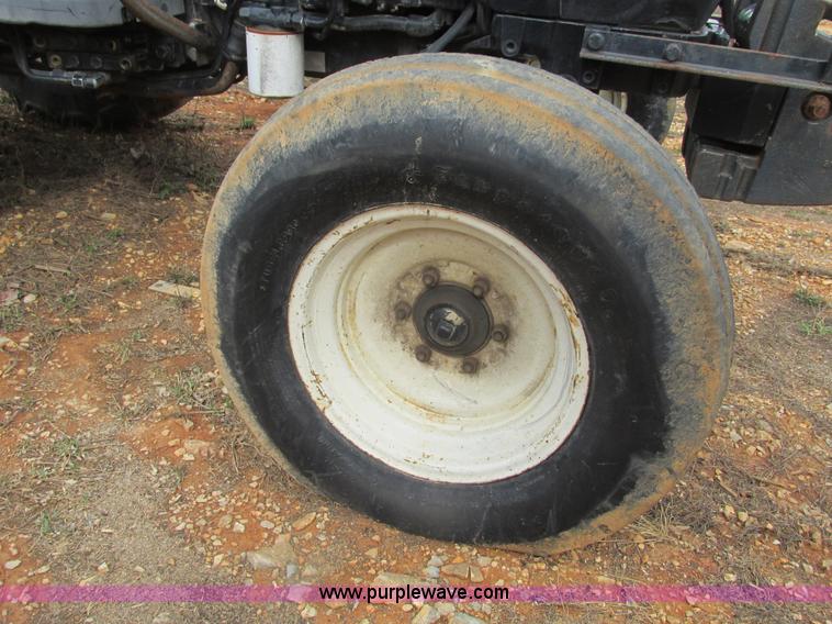 image for item F4469 2004 New Holland TN70 tractor