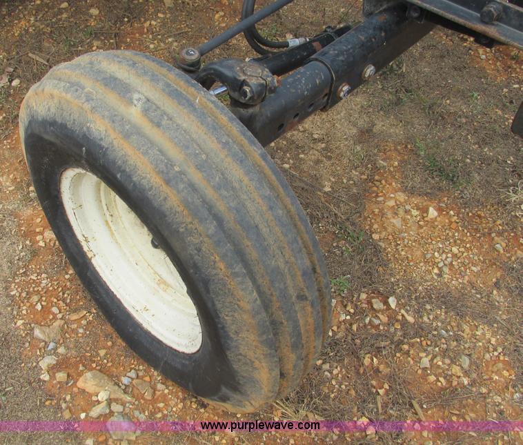 image for item F4469 2004 New Holland TN70 tractor