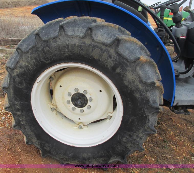 image for item F4469 2004 New Holland TN70 tractor