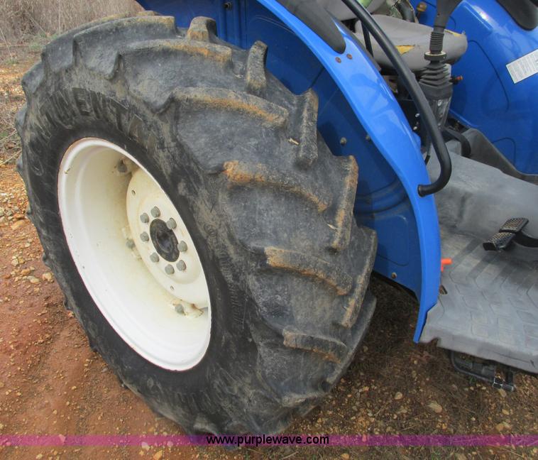 image for item F4469 2004 New Holland TN70 tractor