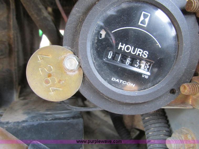 image for item F4469 2004 New Holland TN70 tractor