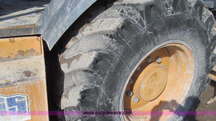 image for item E3793 2001 Case 570 LXT landscape loader