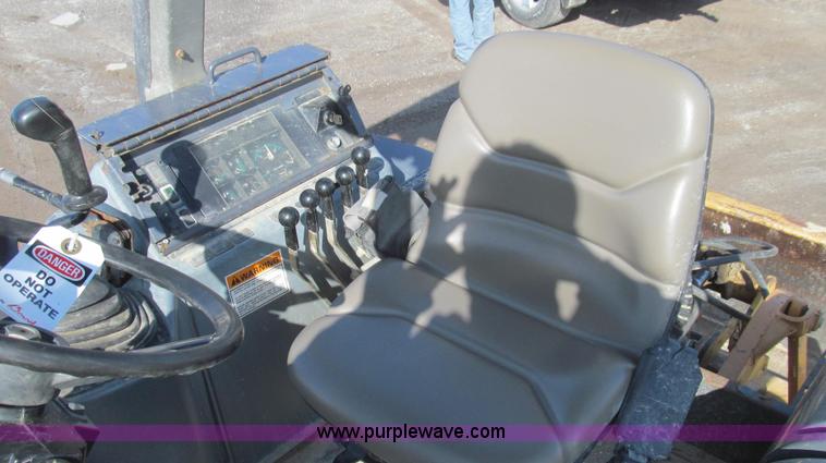 image for item E3793 2001 Case 570 LXT landscape loader