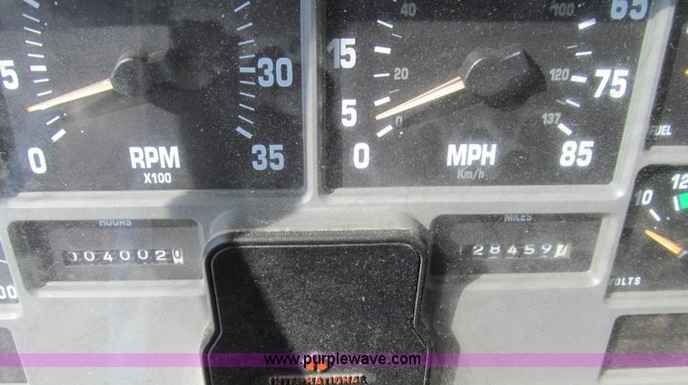 image for item E3798 1998 International 4900 flatbed truck