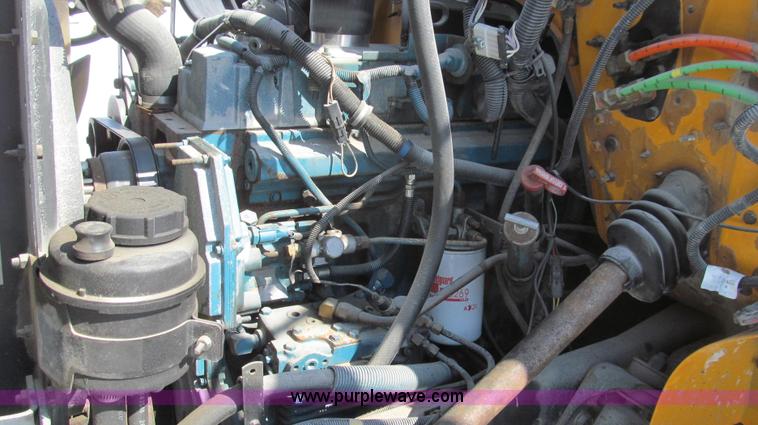 image for item E3798 1998 International 4900 flatbed truck