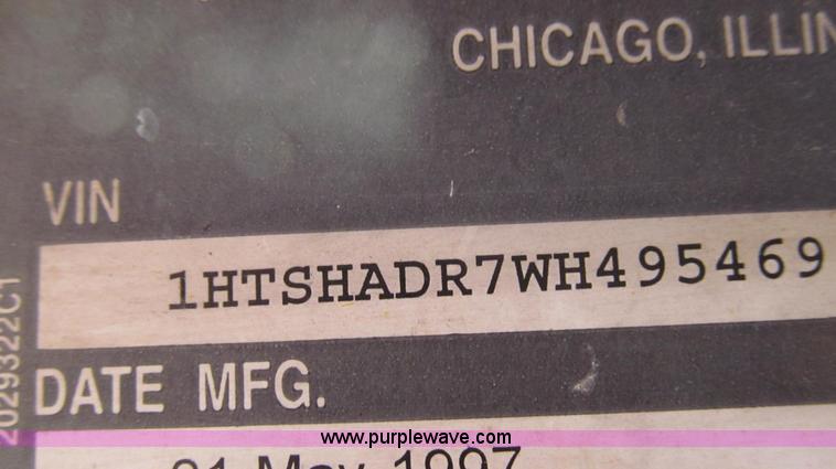 image for item E3798 1998 International 4900 flatbed truck