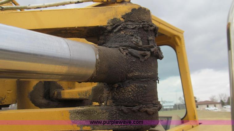 image for item E3812 1989 John Deere 762B scraper