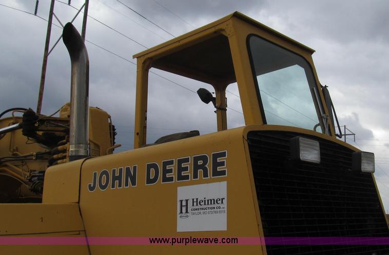 image for item E3812 1989 John Deere 762B scraper