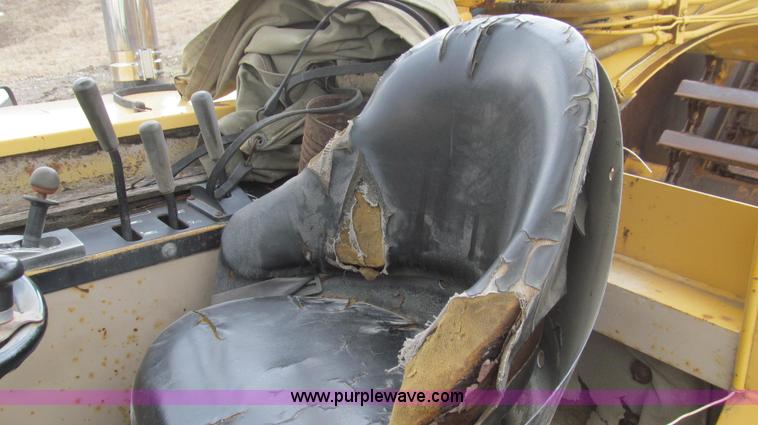 image for item E3812 1989 John Deere 762B scraper