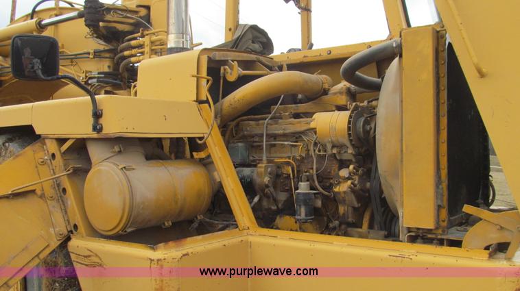 image for item E3812 1989 John Deere 762B scraper