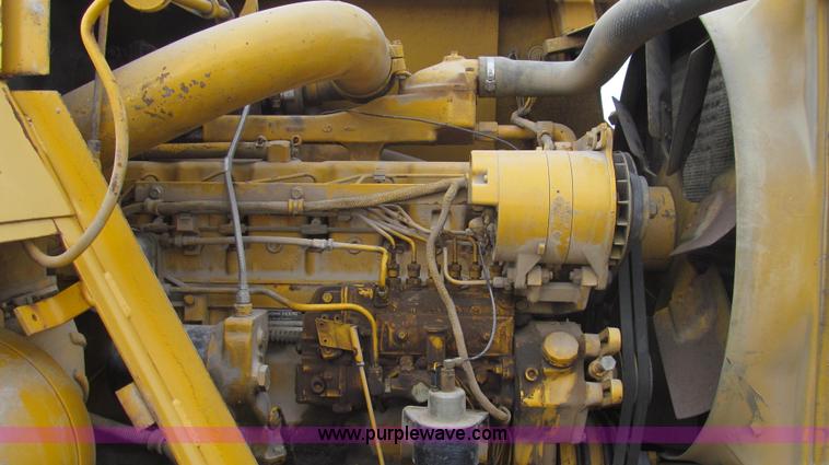 image for item E3812 1989 John Deere 762B scraper