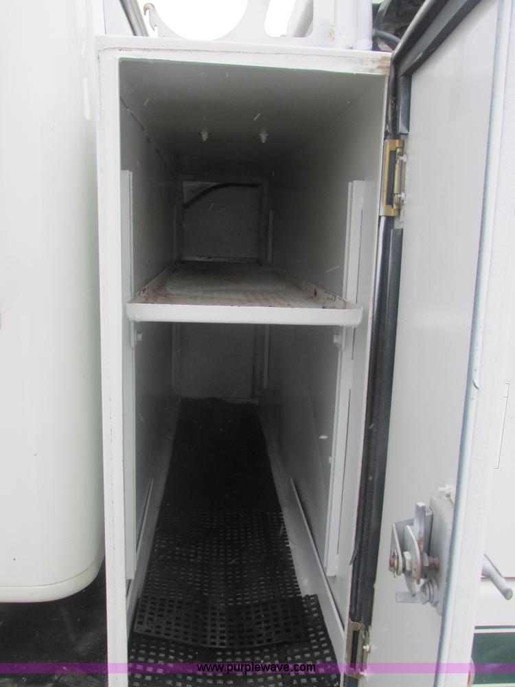 image for item E7118 1999 International 2554 vacuum truck