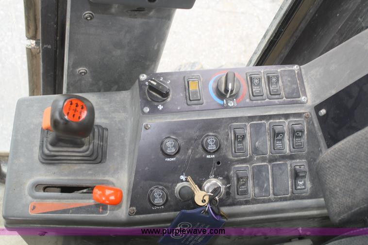 image for item F2541 Champion 720A VHP articulated motor grader