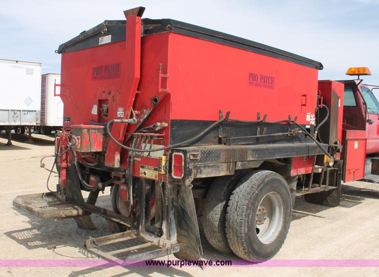 image for item F2941 1995 GMC TopKick pothole patch truck