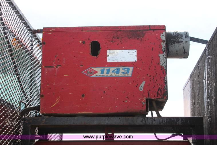 image for item F2941 1995 GMC TopKick pothole patch truck