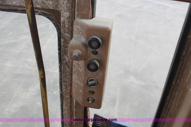 image for item F2945 1995 Caterpillar 140G articulated motor grader