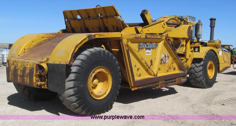 image for item G5663 1973 John Deere 860A paddle scraper