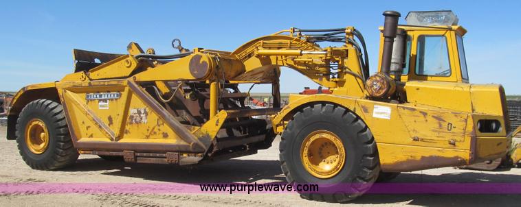 image for item G5663 1973 John Deere 860A paddle scraper