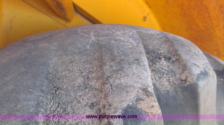 image for item G5663 1973 John Deere 860A paddle scraper