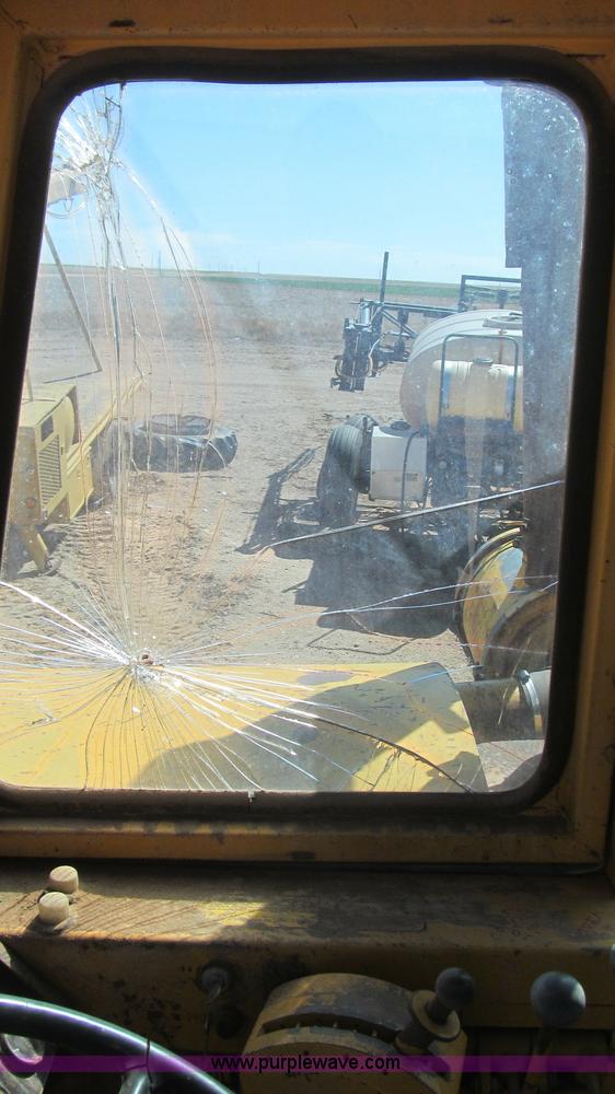 image for item G5663 1973 John Deere 860A paddle scraper