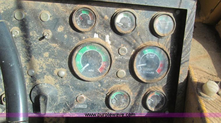 image for item G5663 1973 John Deere 860A paddle scraper