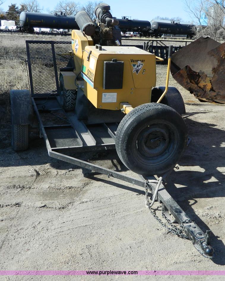 image for item G7784 2004 Vermeer SC252 auto sweep stump cutter