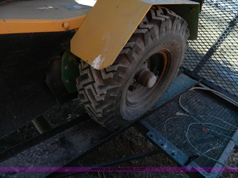 image for item G7784 2004 Vermeer SC252 auto sweep stump cutter