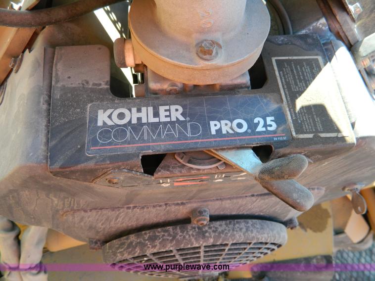 image for item G7784 2004 Vermeer SC252 auto sweep stump cutter