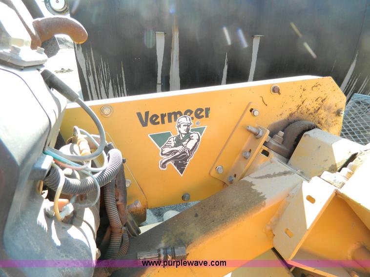 image for item G7784 2004 Vermeer SC252 auto sweep stump cutter