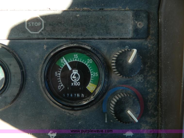 image for item G7796 1997 John Deere 310E backhoe