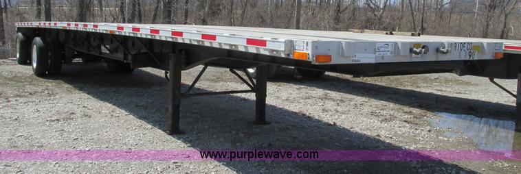 image for item F4494 2009 Transcraft 48' spread axle flat bed trailer