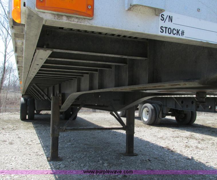 image for item F4494 2009 Transcraft 48' spread axle flat bed trailer