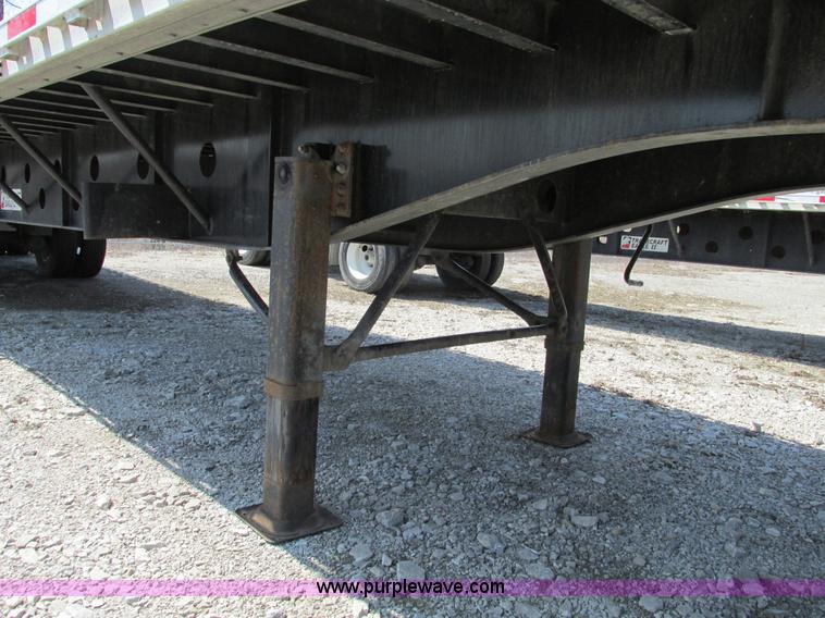 image for item F4494 2009 Transcraft 48' spread axle flat bed trailer