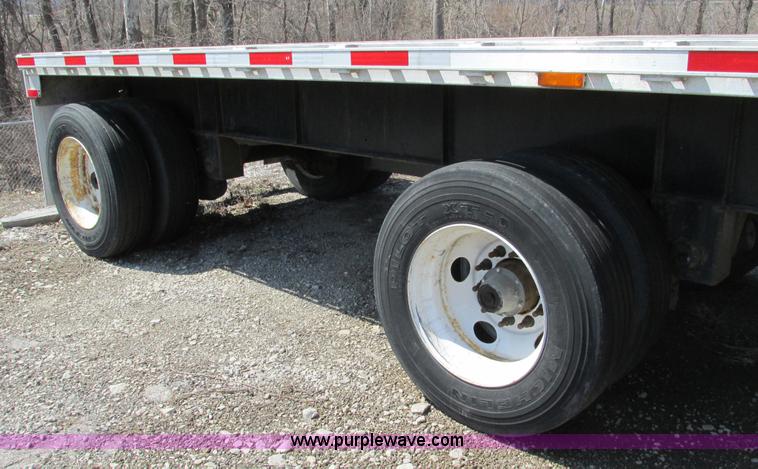 image for item F4494 2009 Transcraft 48' spread axle flat bed trailer