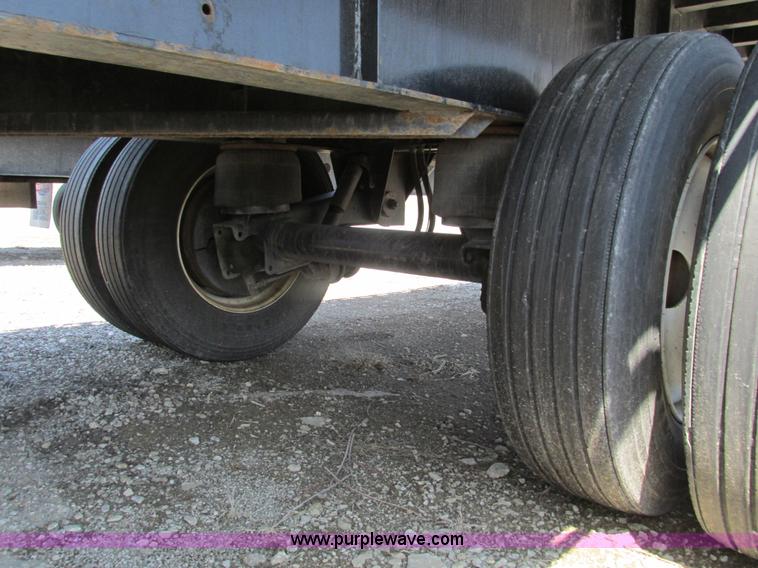 image for item F4494 2009 Transcraft 48' spread axle flat bed trailer