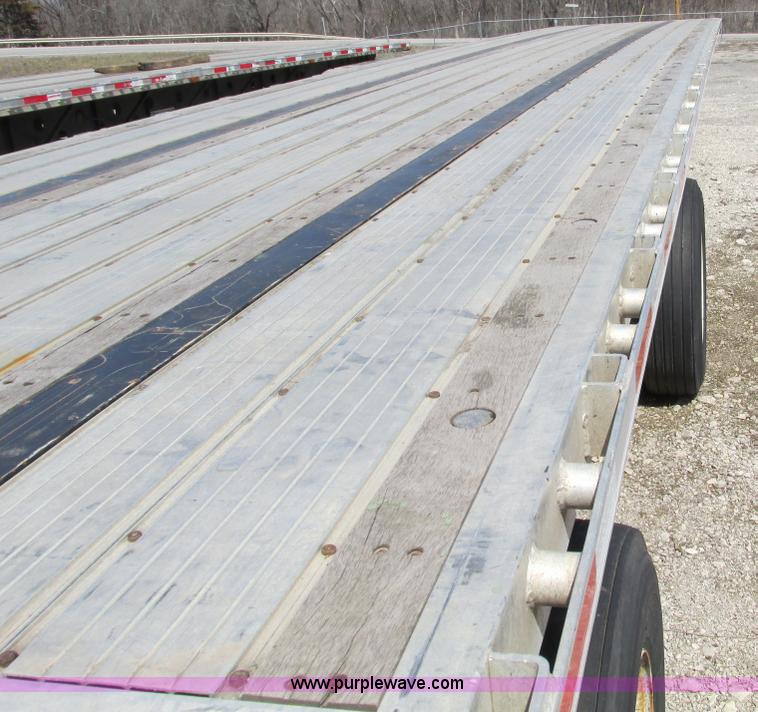 image for item F4494 2009 Transcraft 48' spread axle flat bed trailer