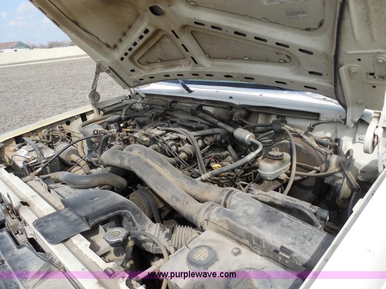 image for item E3367 1991 Ford F250 XLT Lariat flatbed truck