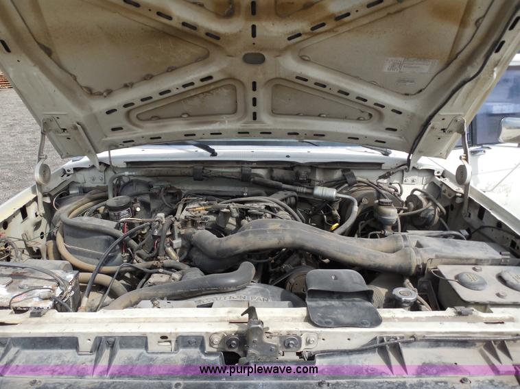 image for item E3367 1991 Ford F250 XLT Lariat flatbed truck