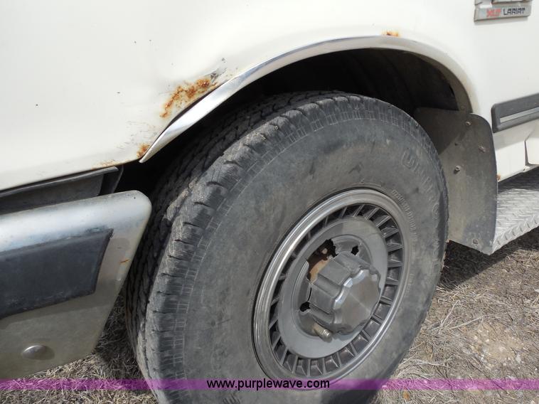 image for item E3367 1991 Ford F250 XLT Lariat flatbed truck