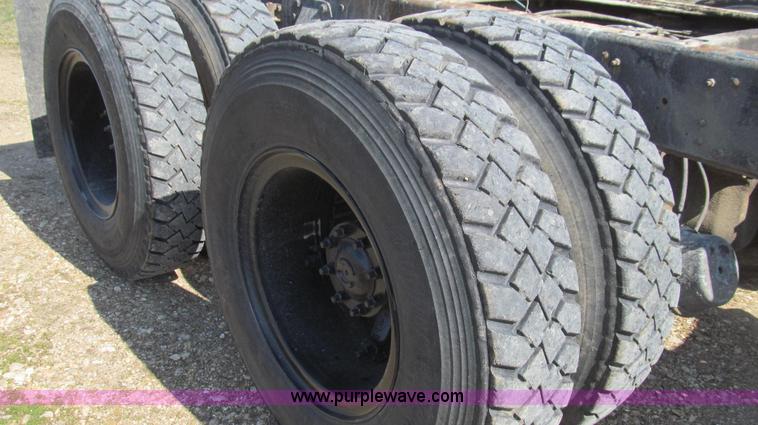 image for item E3819 1989 GMC Sierra tandem axle cab and chassis